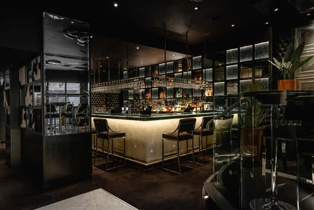 Sleek bar area in Gaucho Manchester, ideal for cocktail receptions and networking events.