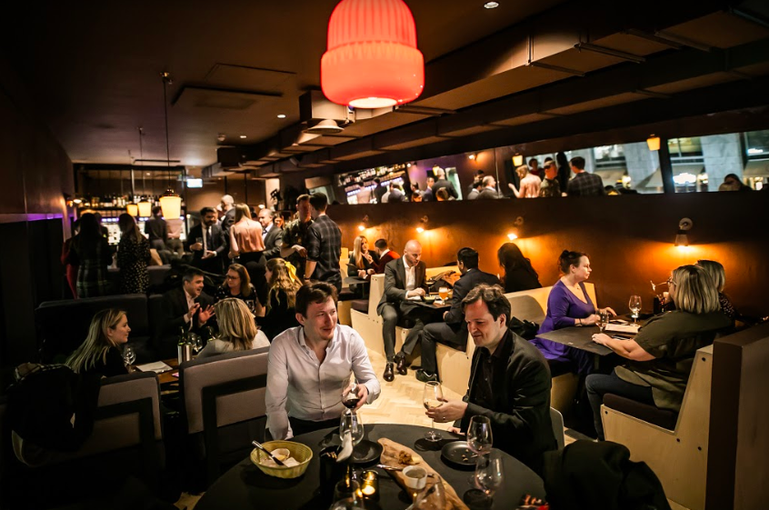 Vibrant venue at The Mezzanine, ideal for networking events and social gatherings. - Banner