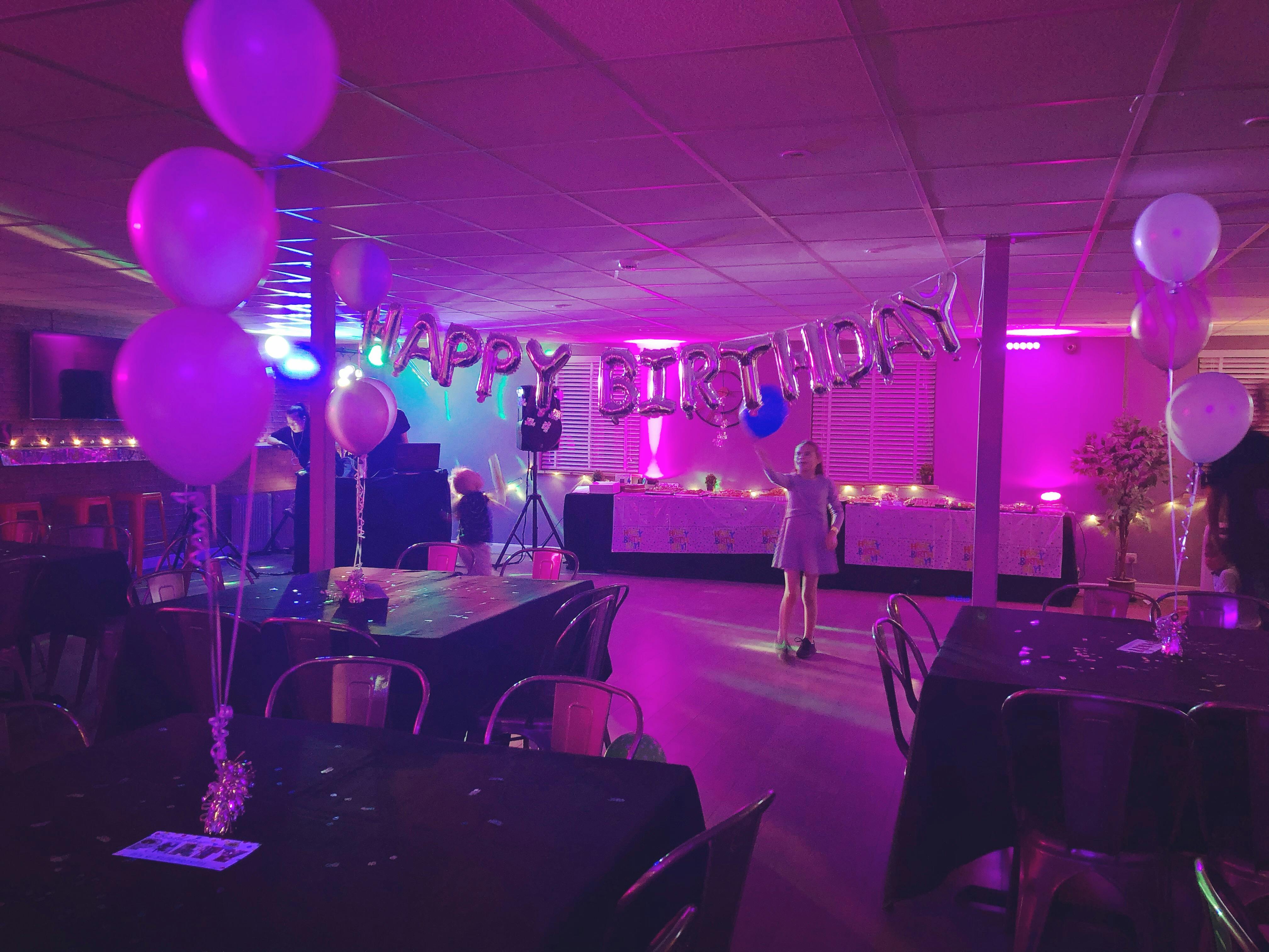 Vibrant birthday celebration venue at Lagoona Bar & Grill with festive decor and lighting.