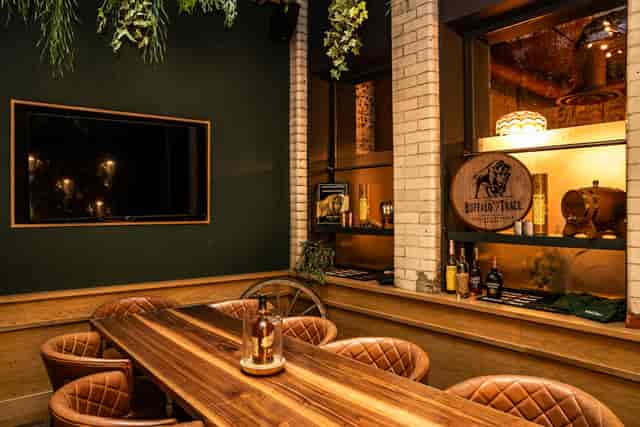 Private dining room at The Wren Tavern, featuring plush seating for meetings and events.