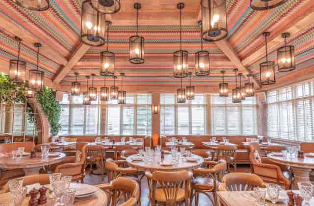 The Orangery in Victors: elegant event space with warm wood accents for upscale gatherings.