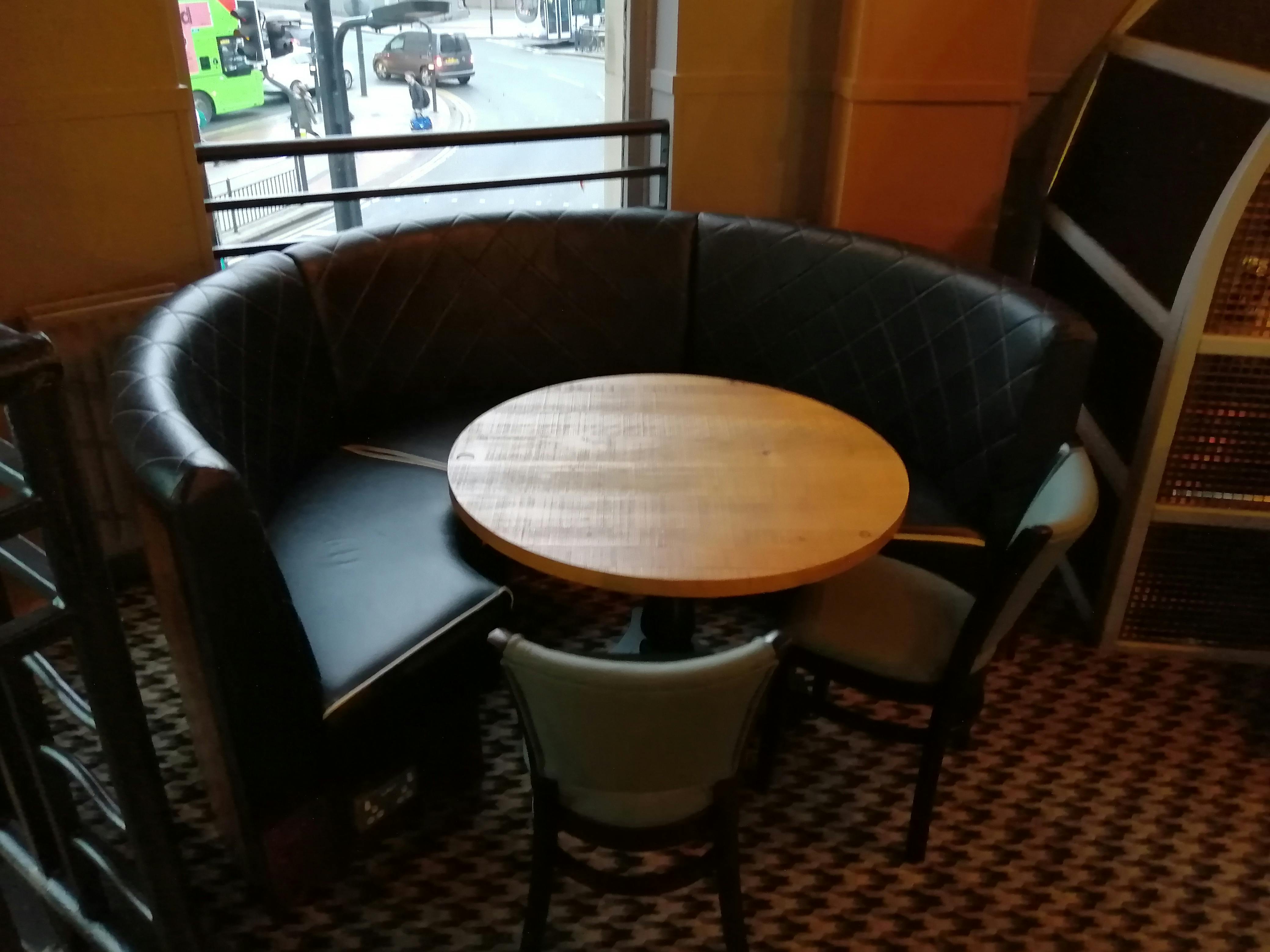 Cozy booth in O'Neill's Leeds, perfect for meetings and casual events.