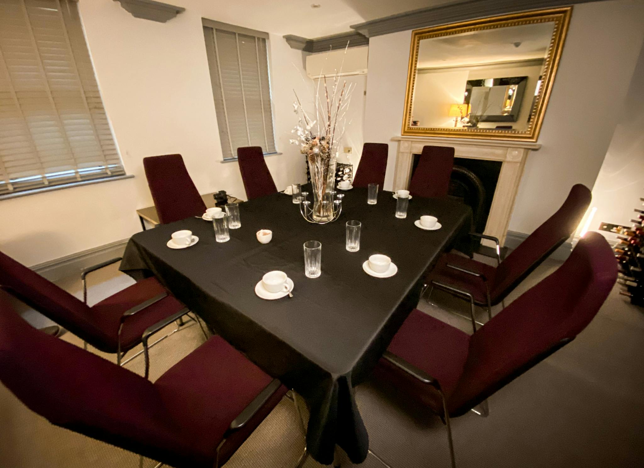 Fox Meeting Room at The Fox Club Mayfair with round table, ideal for corporate events.