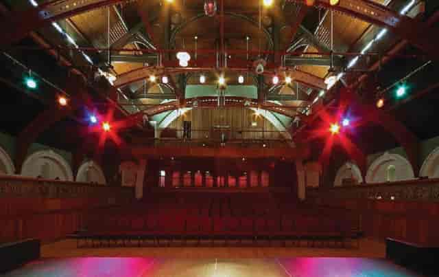 Elegant auditorium with high wooden ceilings for conferences and performances at The Tabernacle.