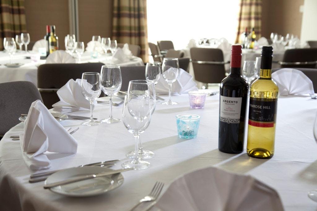 Elegant dining table setup for corporate event at Holiday Inn London Stratford City.