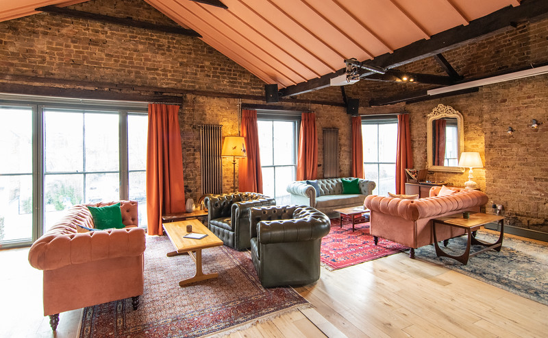 Stylish meeting space at The Bar Above, ideal for brainstorming and networking events. - Banner