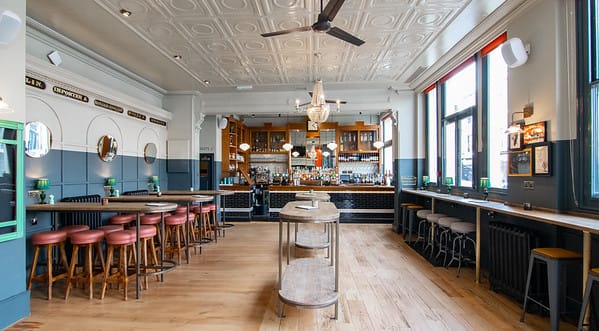 Stylish Main Bar in The Lost Hours, ideal for intimate gatherings and networking events.