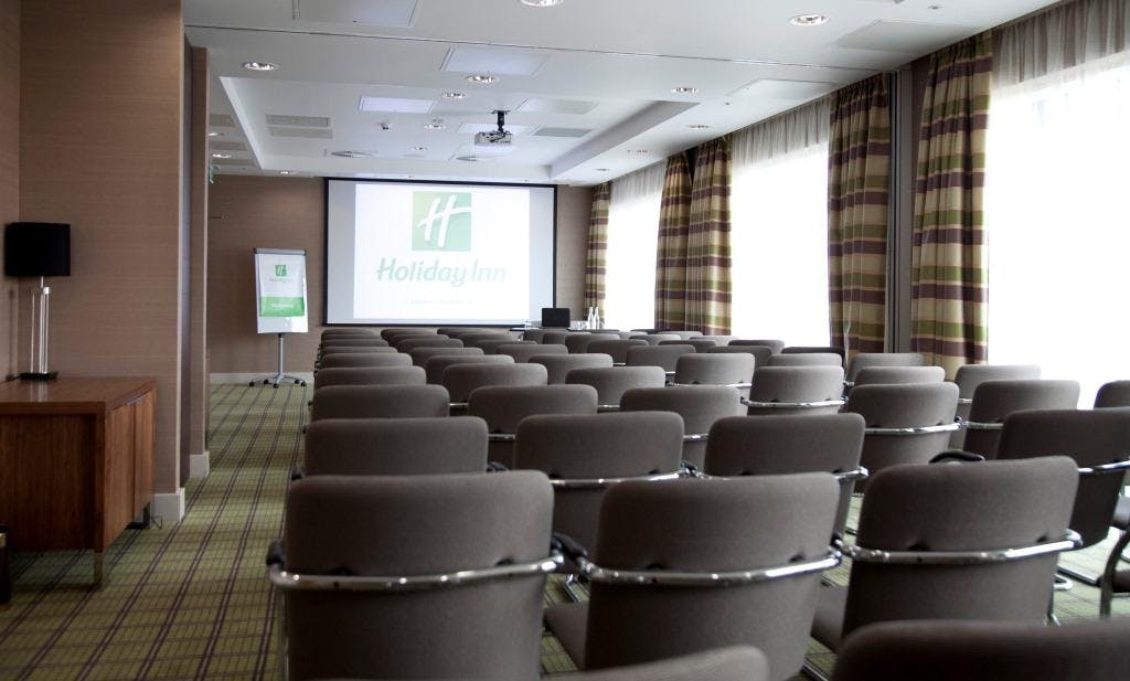 "Meeting room at Holiday Inn Stratford City, ideal for corporate events and workshops."