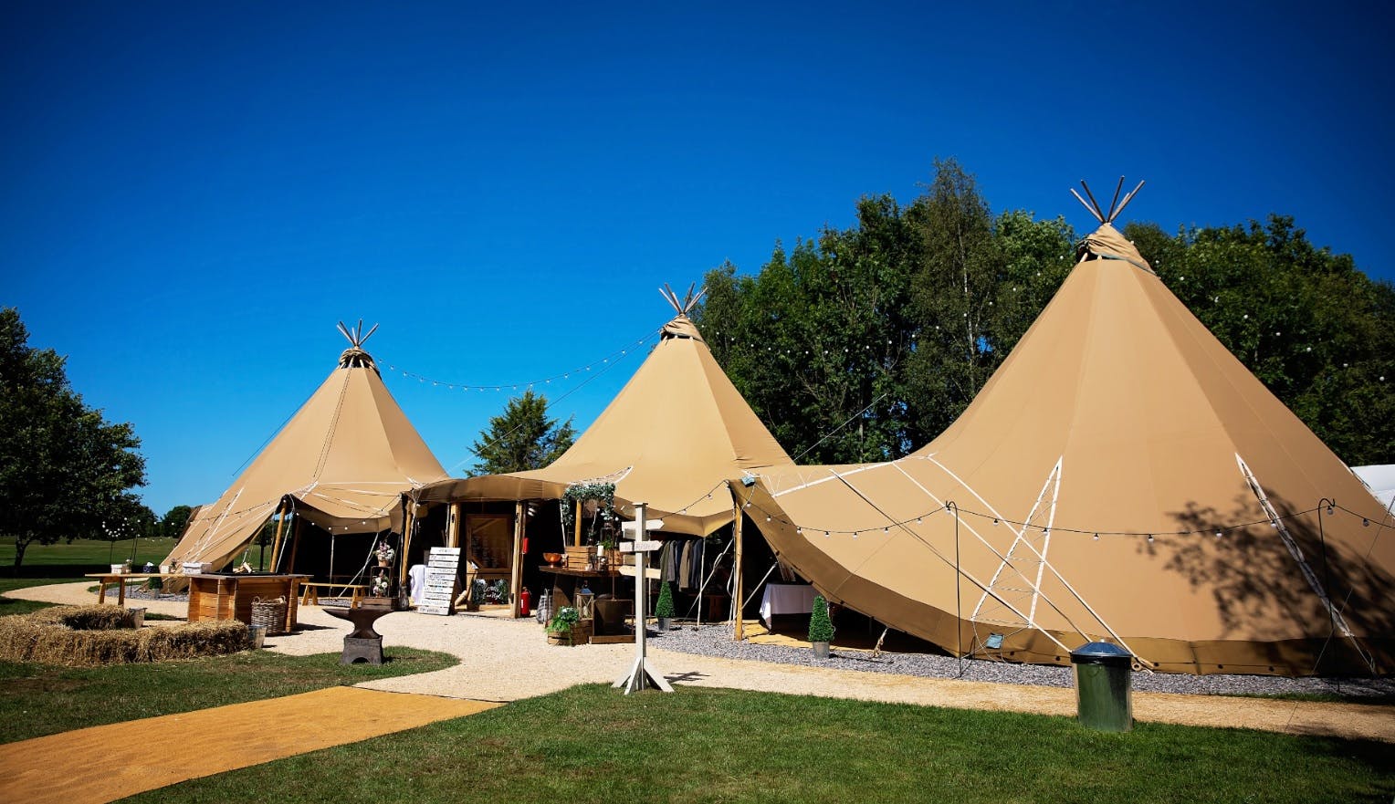 Woodlands Tipi at Blacknest Golf Club, rustic teepee venue for summer events and retreats.