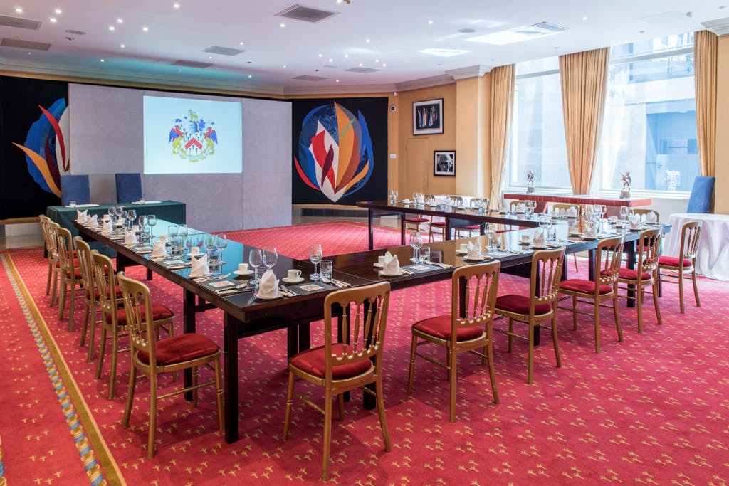 Piper Room at Grocers' Hall, U-shaped tables set for corporate meetings and workshops.