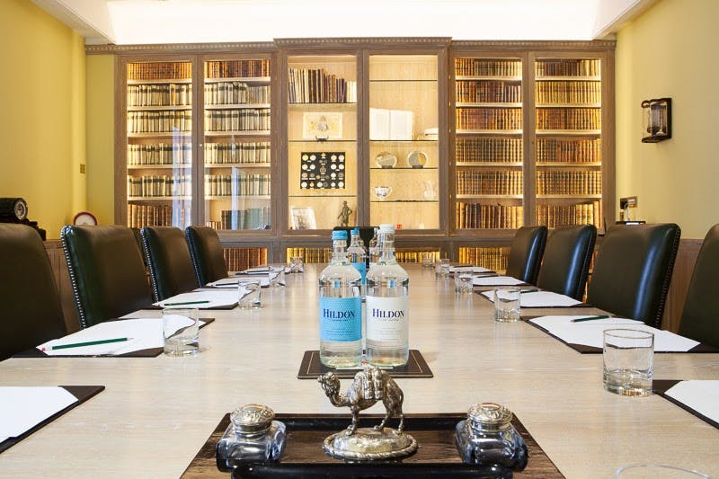 Pitt Library boardroom with elegant decor, ideal for high-level meetings and events.