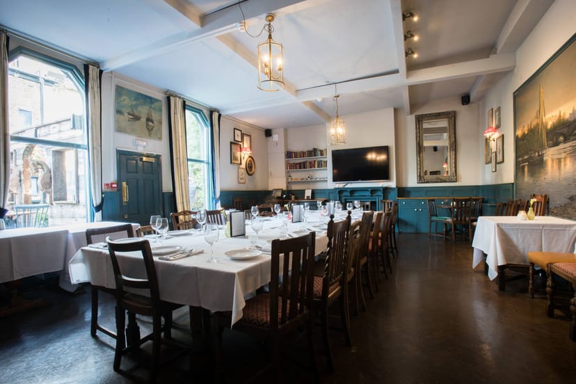 Semi-private dining room with AV for board meetings and rehearsal dinners.