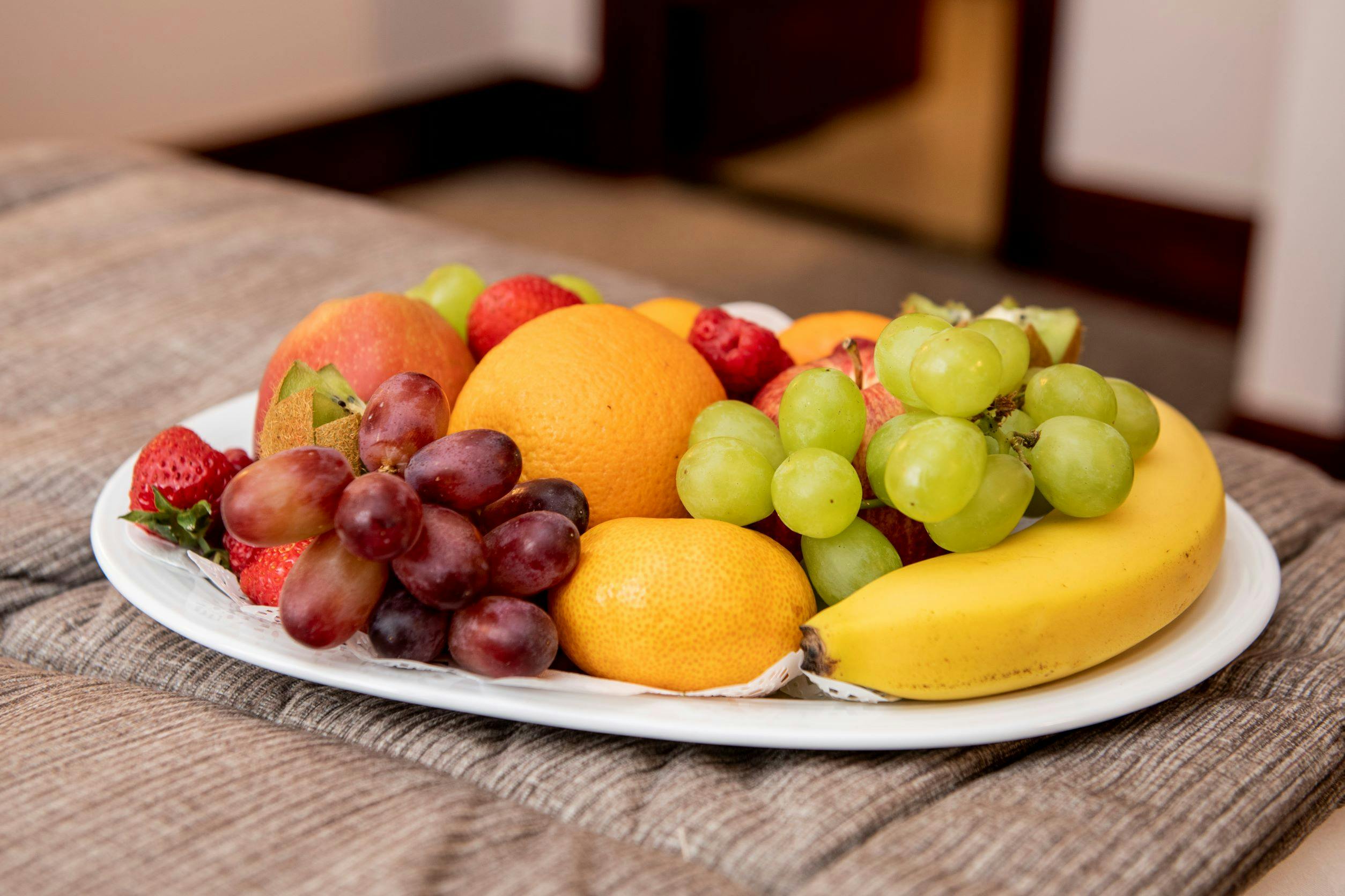 "Vibrant fruit platter in Portland Suite, Fitzrovia Hotel for meetings and events."