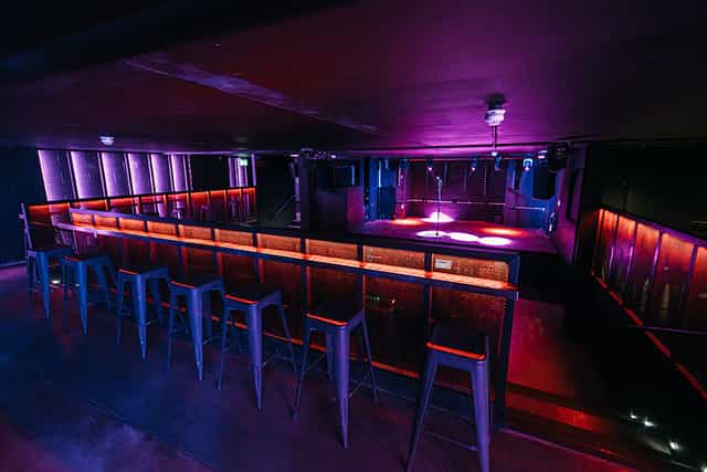 Modern event space in Peckham Audio with vibrant lighting, ideal for parties and gatherings.