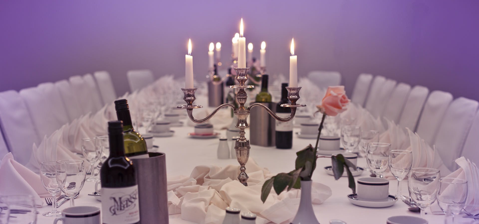 Langham Suite dining table with elegant decor for weddings and corporate events.