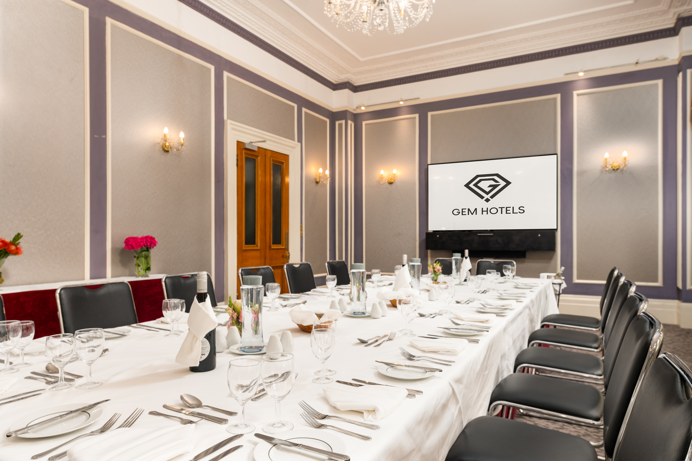 Elegant meeting room in Gem Strathmore Hotel, perfect for upscale events and presentations. - Banner