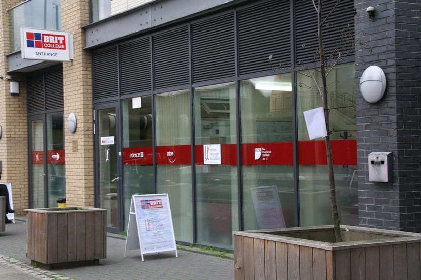 Modern Brit College in Limehouse with large glass windows, ideal for events and meetings.