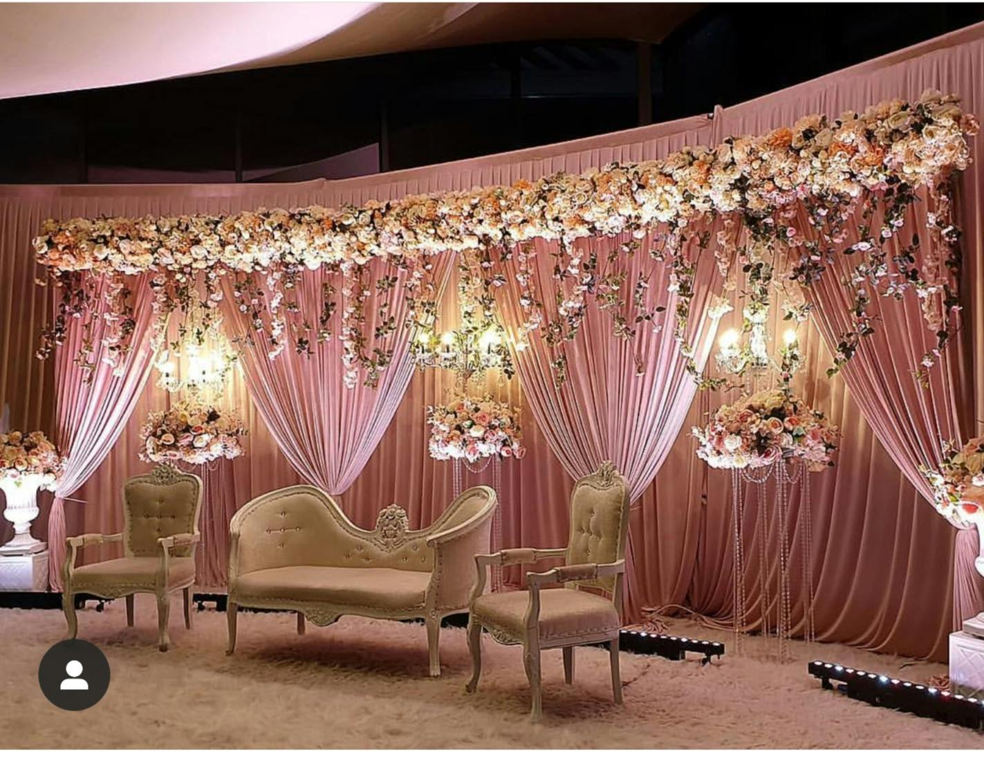 Elegant floral backdrop in Main Hall, The Ark Royal for weddings and upscale events.