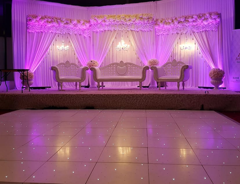 Elegant Main Hall at The Ark Royal, featuring floral decor for weddings and upscale events.
