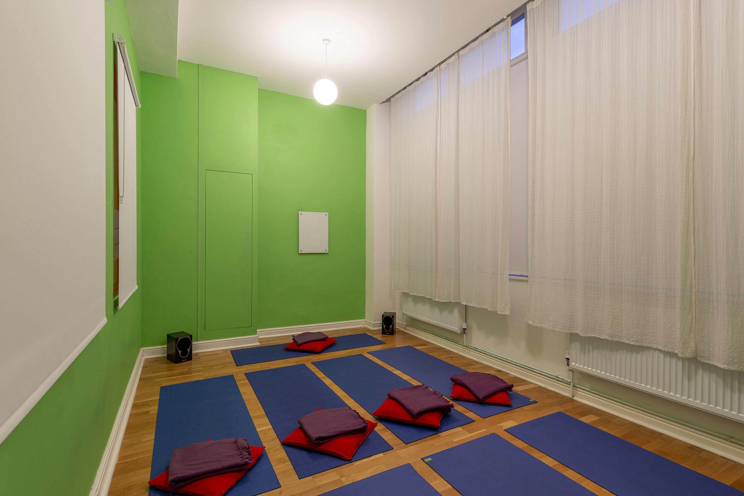 Ganesha studio at Tara Yoga Centre, serene space for wellness events and mindfulness sessions.