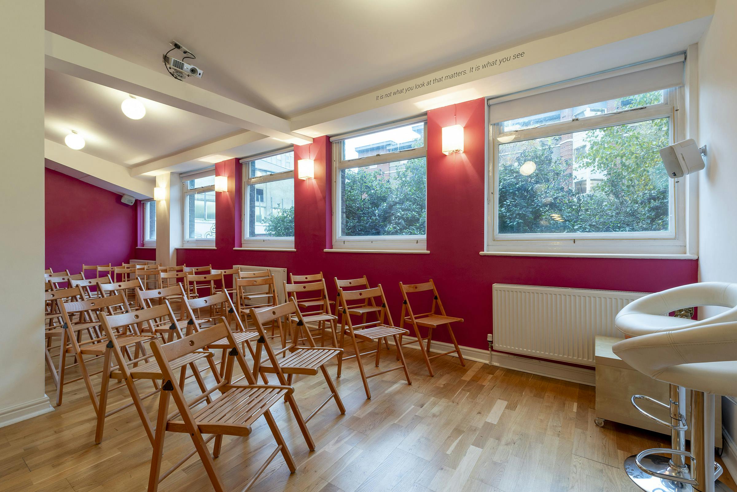 Parvati Studio at Tara Yoga Centre: vibrant meeting space for workshops and presentations.