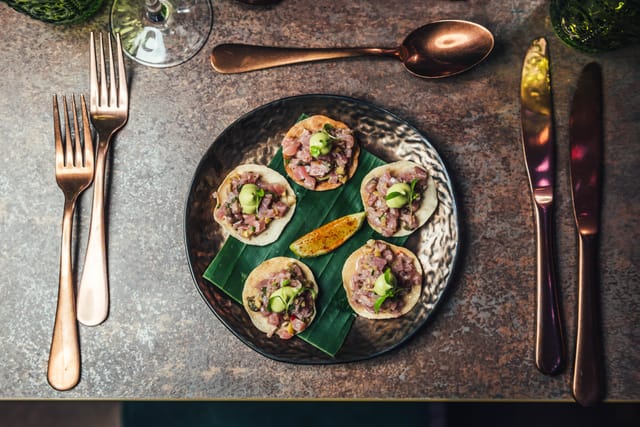 Elegant gourmet appetizers in Jako London's lounge area for upscale events.