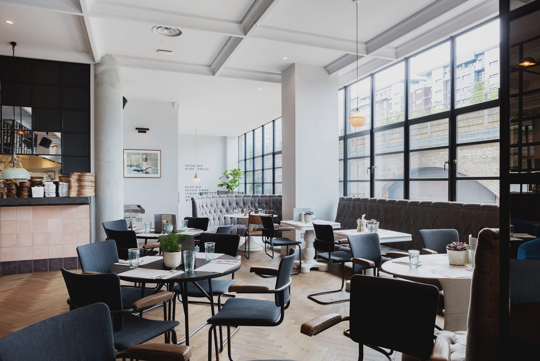 Modern venue with large windows for intimate meetings and events at No.29 Power Station West. - Banner