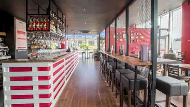Modern bar area in Veeno Bristol, perfect for networking events and cocktail receptions.