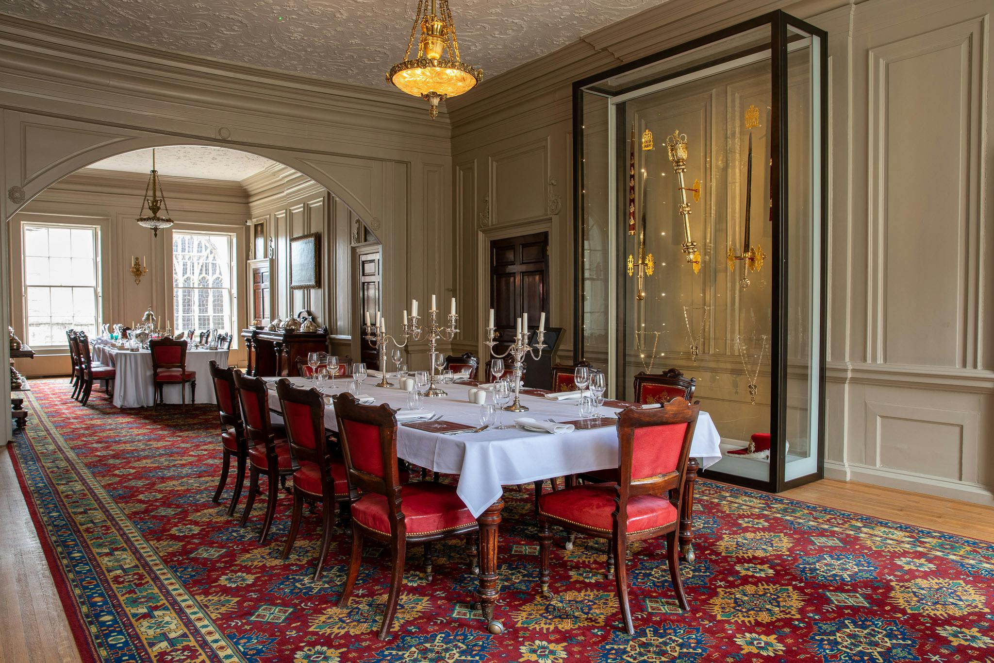 Elegant dining room in York Mansion House, set for formal events with candelabras.