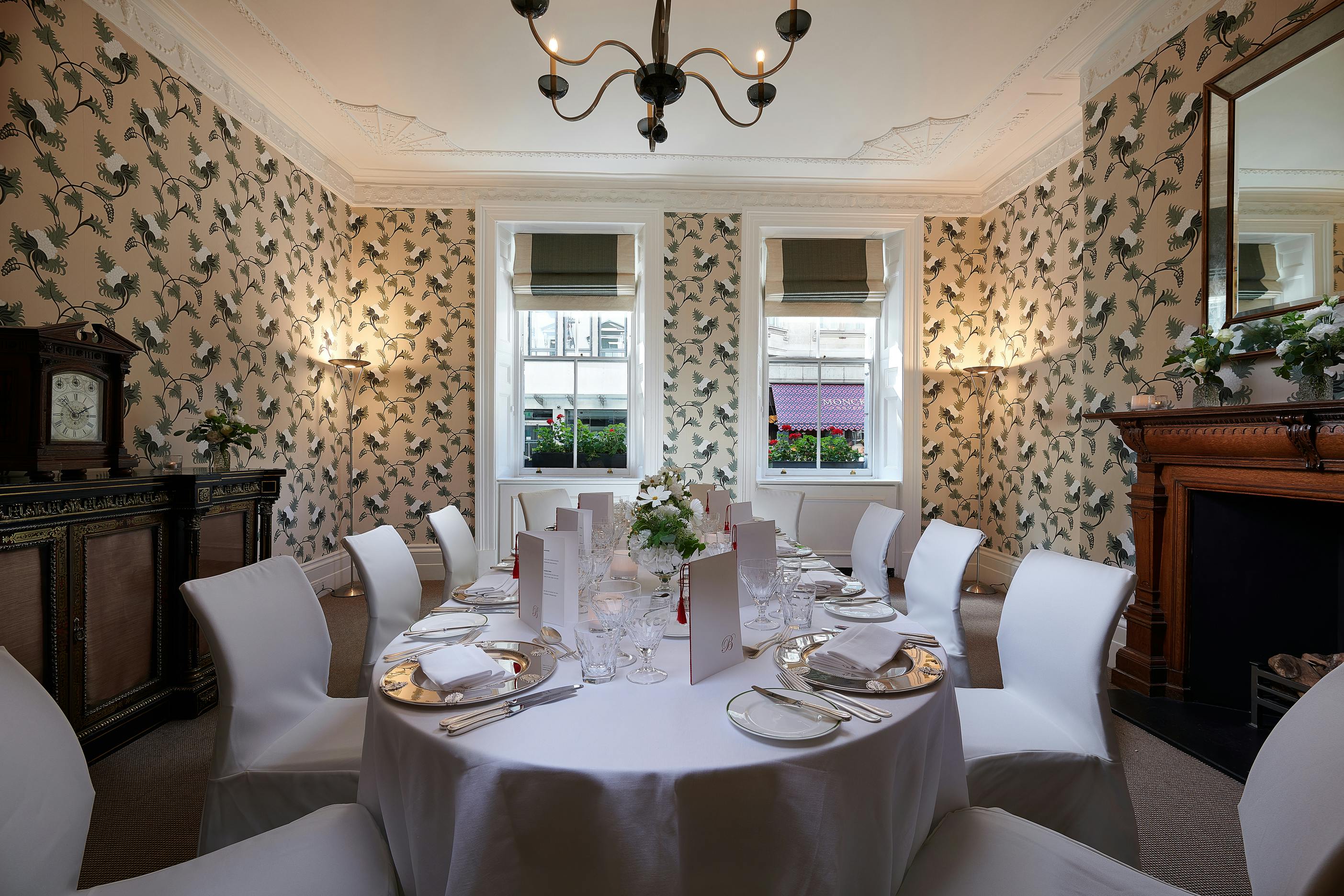 Lord Byron dining in an elegant Brown's Hotel room, ideal for intimate events.