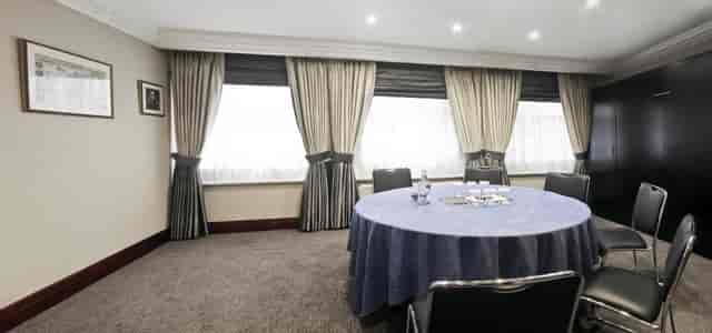 Syndicate Room at Fitzrovia Hotel, elegant meeting space for strategic discussions.