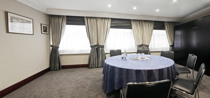 Syndicate Room at Fitzrovia Hotel, elegant meeting space for strategic discussions.