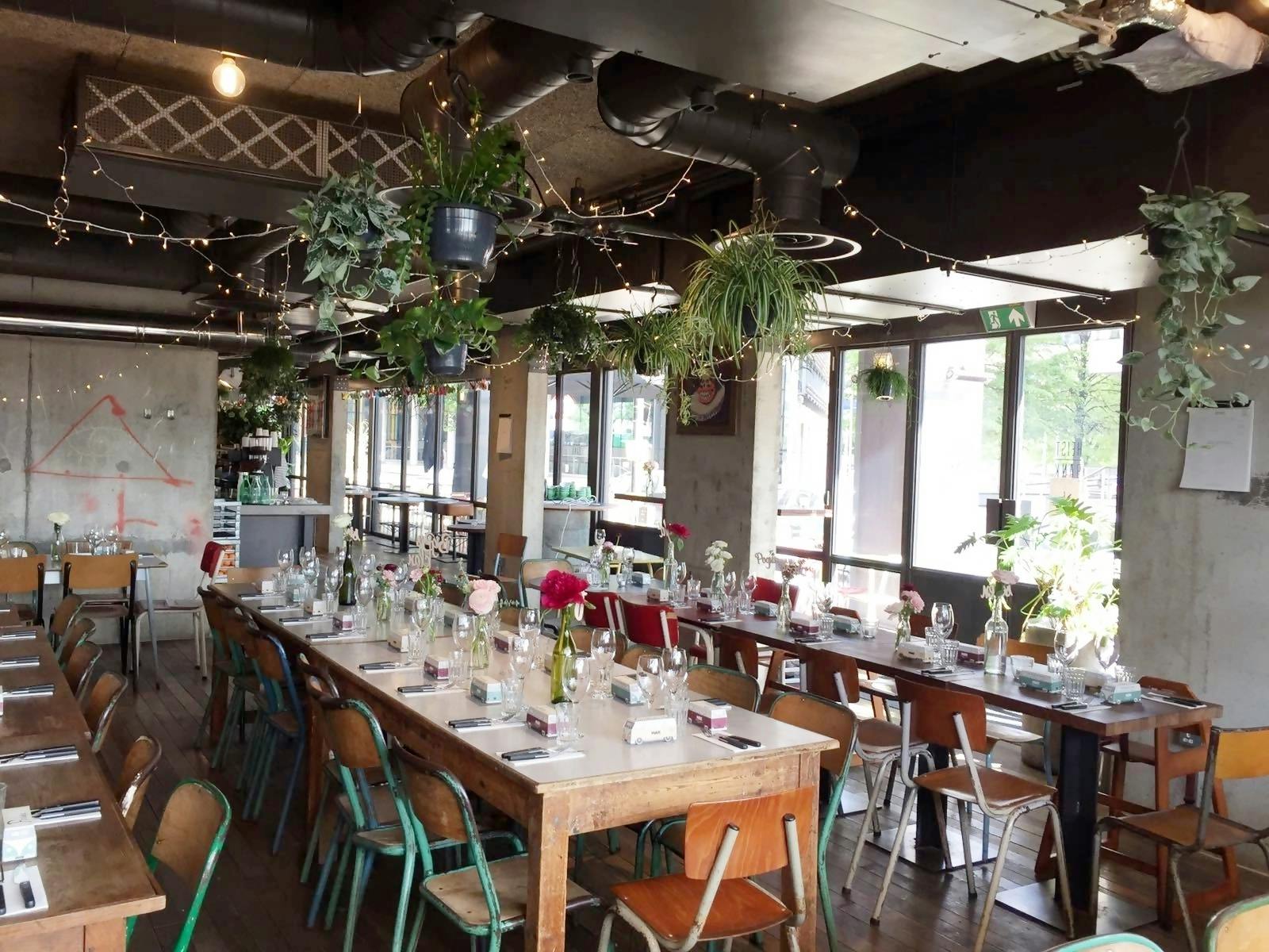 "Whole Venue in Heist Bank with communal tables, ideal for gatherings and events."