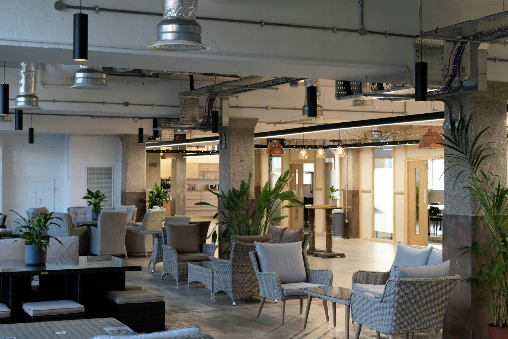 Modern breakout space with stylish seating for versatile meetings and networking events.