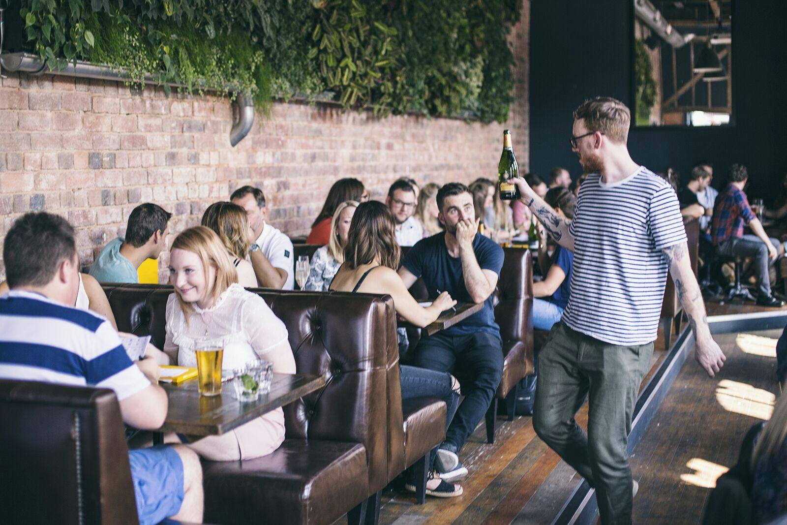 Vibrant social gathering at Upstairs Bar, ideal for networking events and casual meetups.