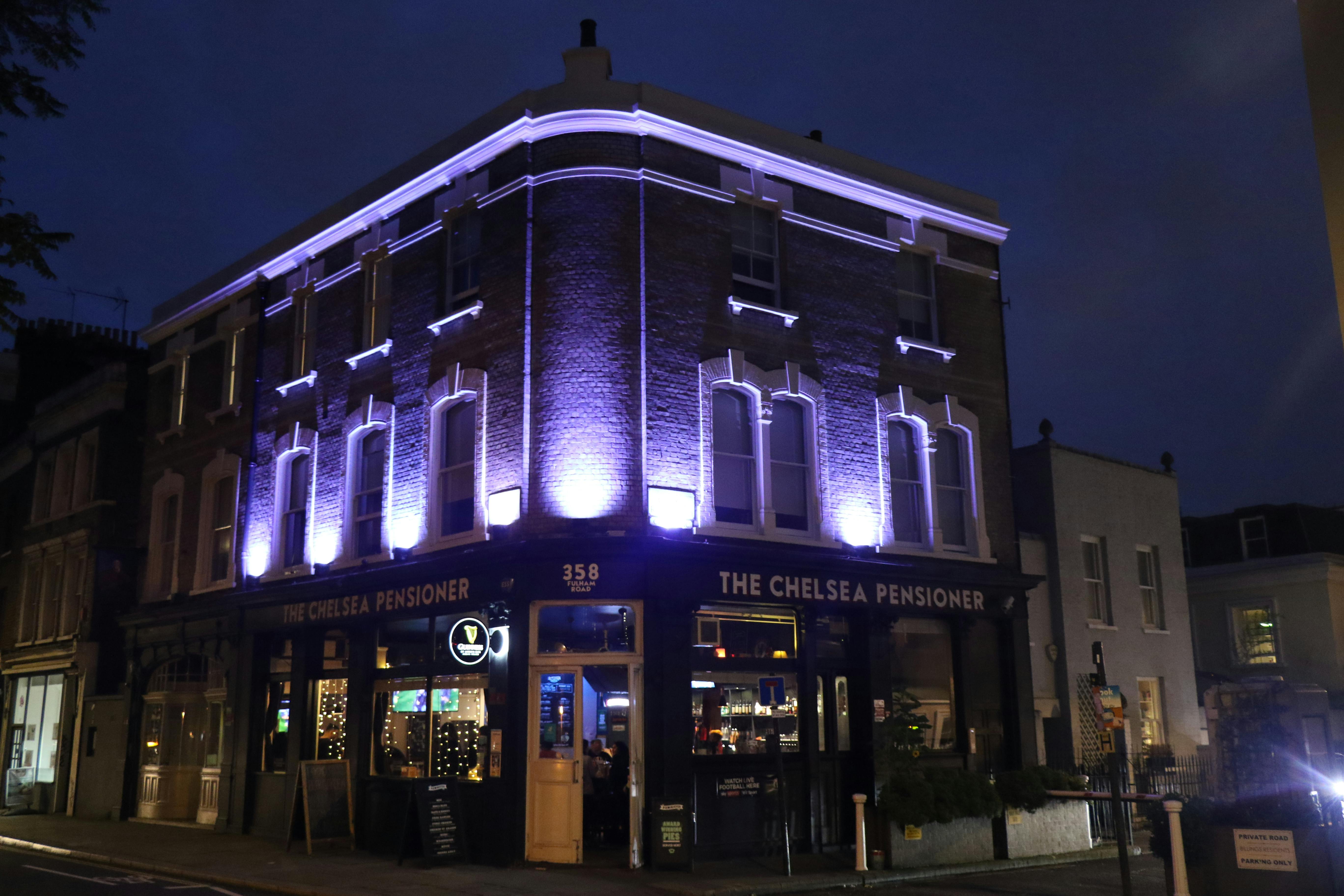 Stylish Chelsea Pensioner venue with ambient lighting for events and gatherings.