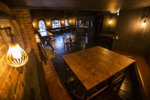 "Charming Gin Parlour event space in The Distillery Birmingham, perfect for gatherings."