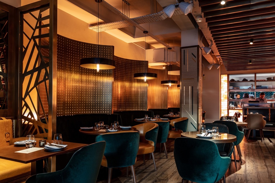 Stylish restaurant interior at Farzi London, ideal for intimate meetings and events. - Banner