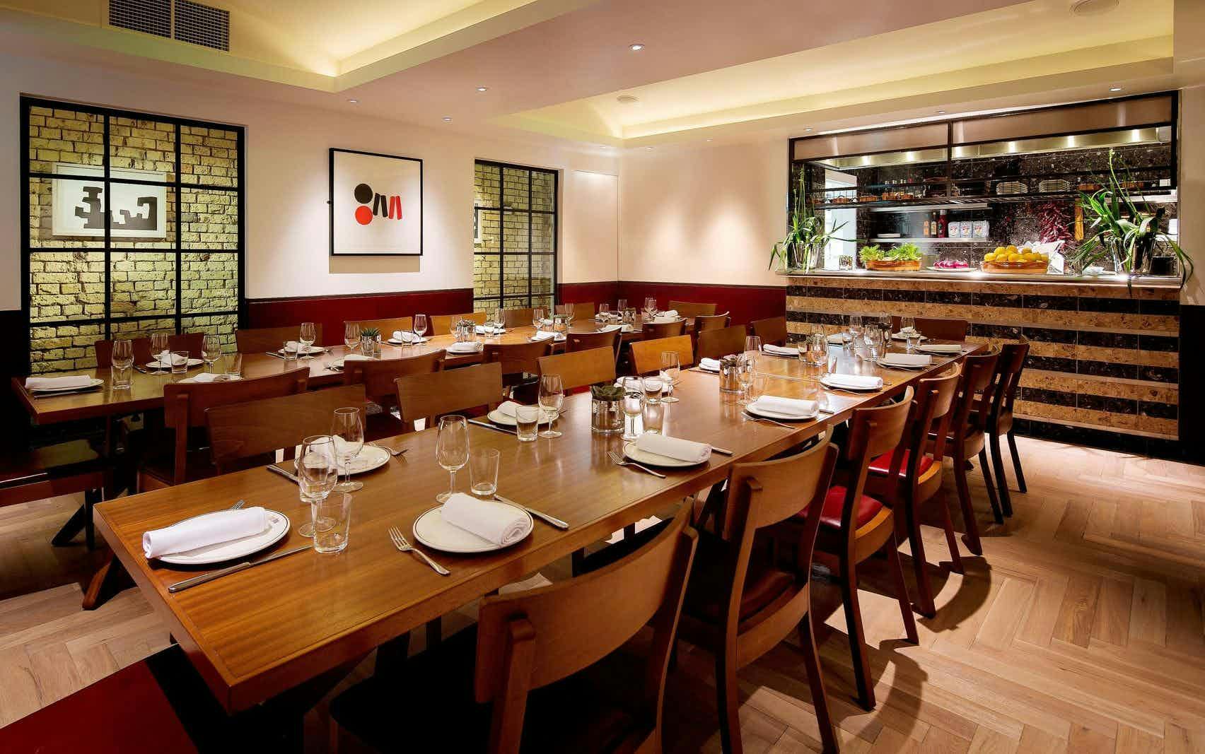 Private dining room at Barrafina Drury Lane, elegant table for intimate gatherings.