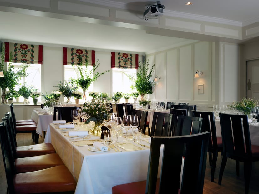 Elegant dining setup in The Marx Room, Quo Vadis for corporate events and gatherings.