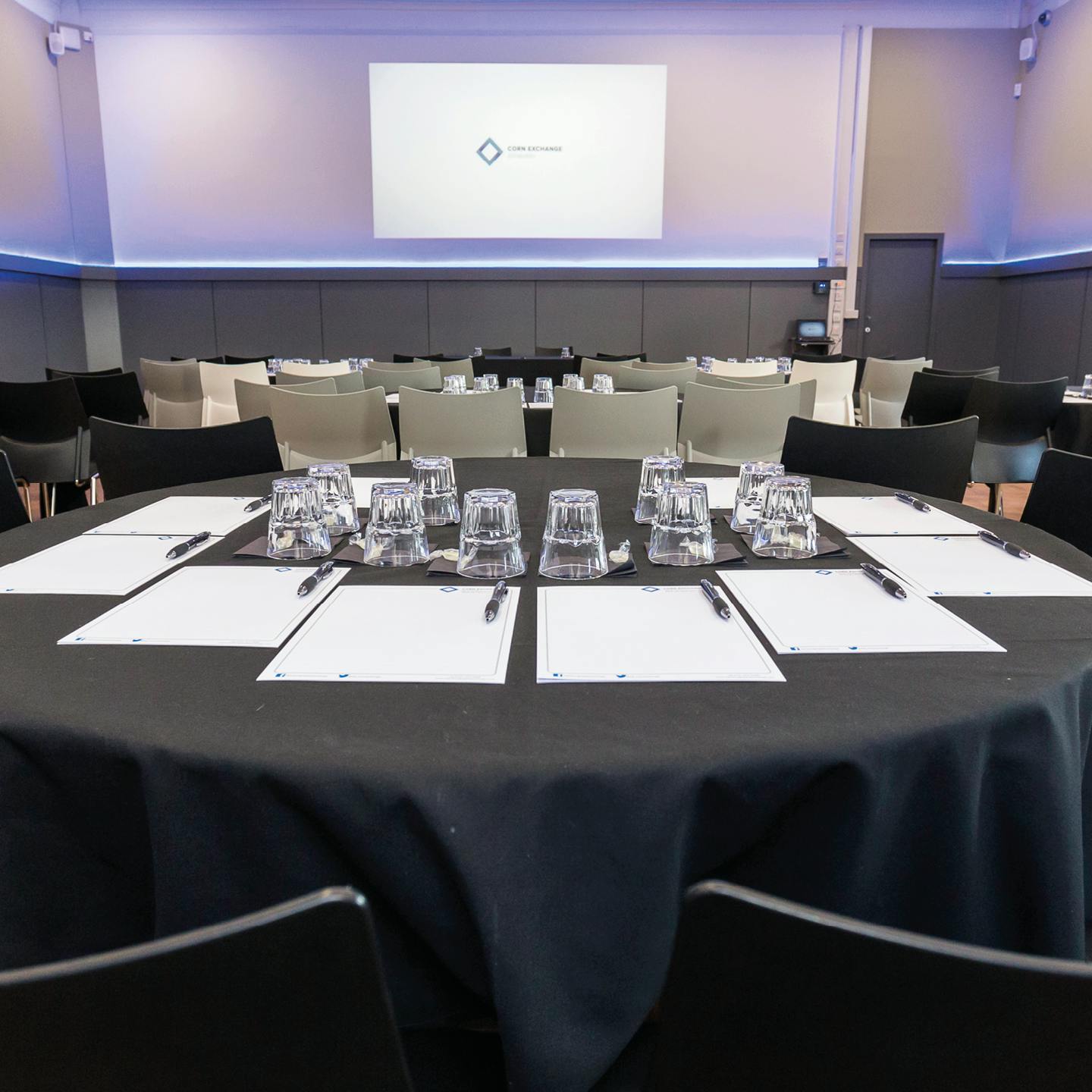 Meeting setup at O2 Academy Edinburgh with black tablecloths for professional events.