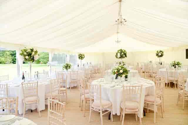 Elegant marquee setup on Croquet Lawn, Wakehurst for weddings and upscale events.