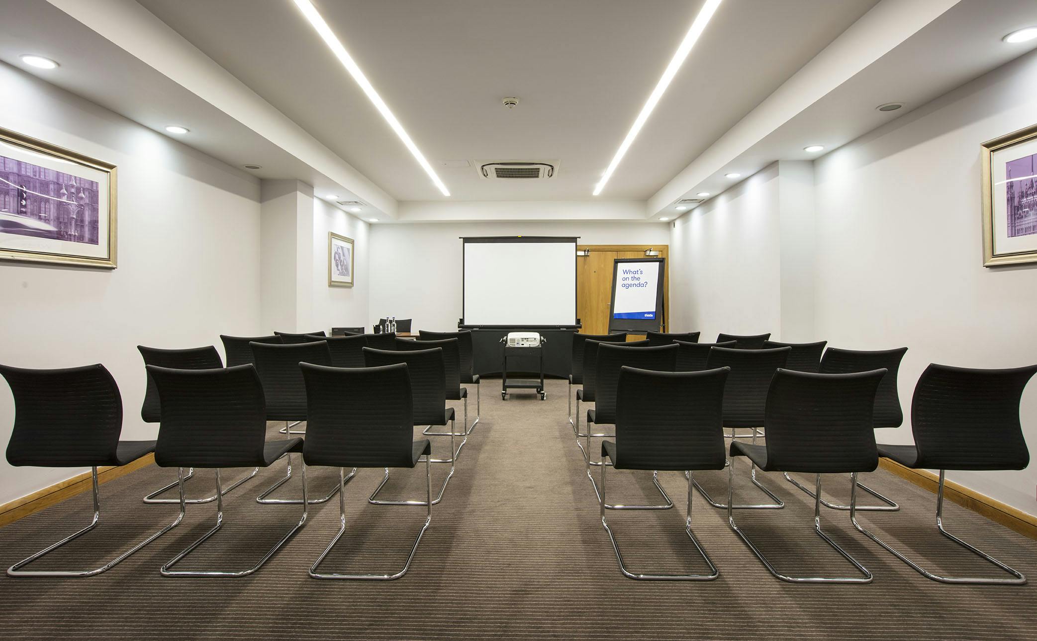 Modern meeting room at Hawksmoor, Thistle Holborn, ideal for corporate events and presentations.