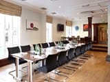 Gravity Bar meeting room with natural light, perfect for corporate meetings and workshops.
