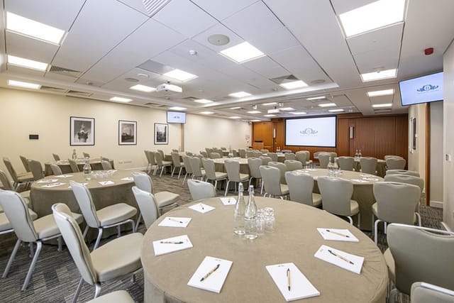 Maynard Theatre conference meeting room round tables projector
