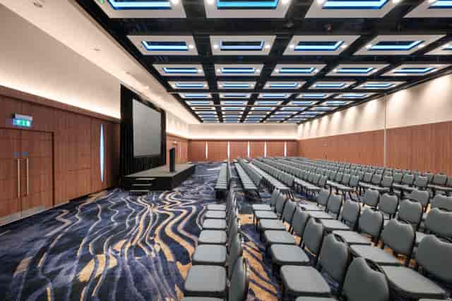 London VII ballroom with theater seating for corporate presentations and keynote events.