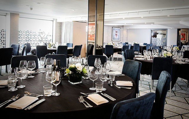 Elegant event space in Malmaison Birmingham set for a formal dinner and networking. - Banner
