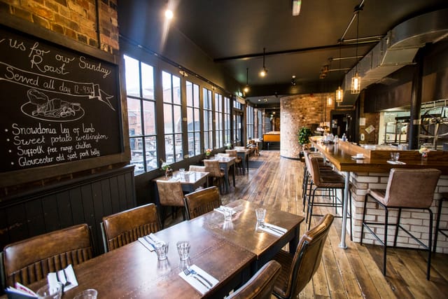 Stylish restaurant in The Distillery Birmingham, perfect for events with warm ambiance.