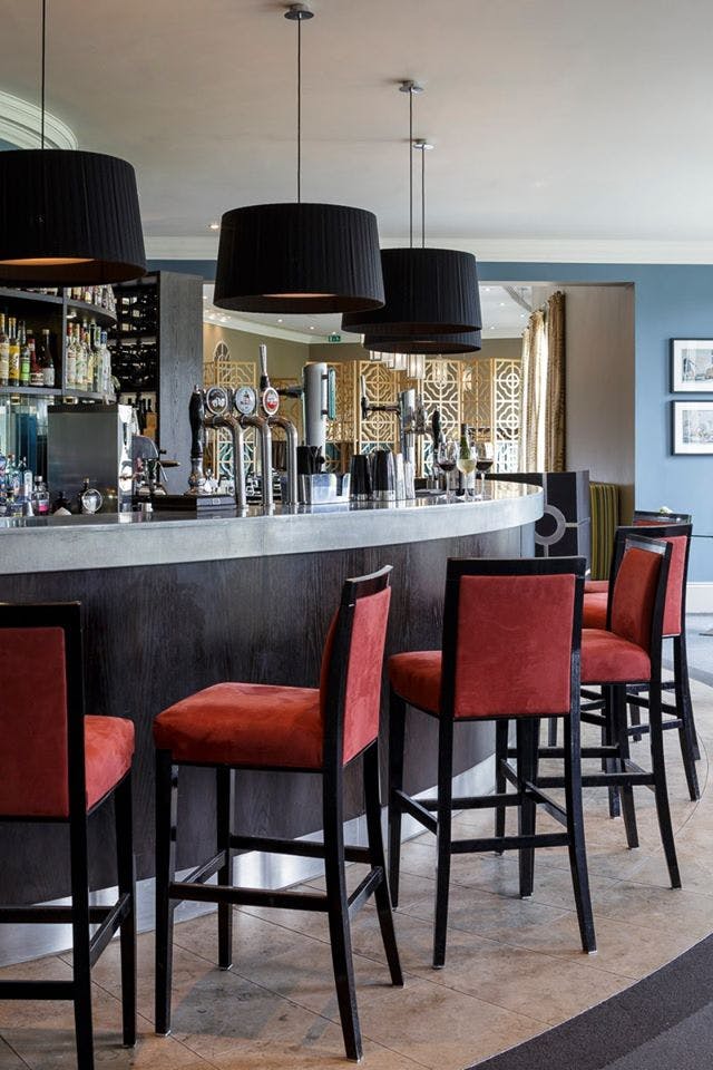 Modern bar area in The Kerry Suite, Bowood Hotel; ideal for networking events.