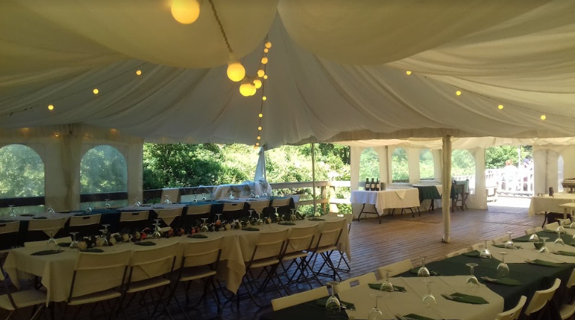 Elegant event tent at Beeses Riverside Bar, perfect for weddings and corporate gatherings. - Banner